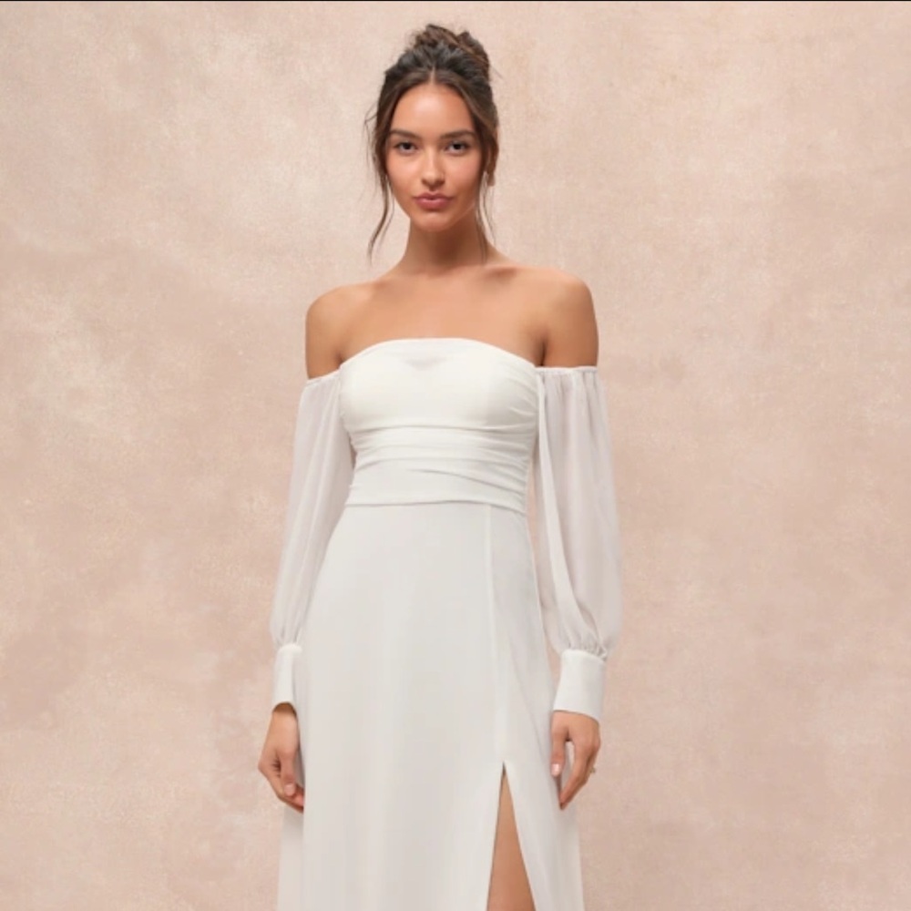 White off-the-shoulder long sleeve wedding dress